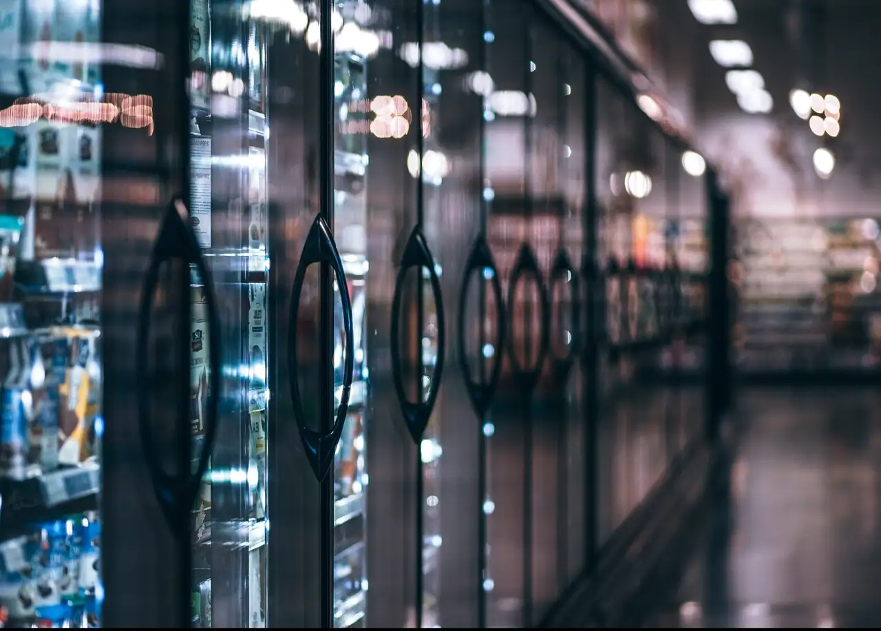 Refrigerated FMCG products displayed in a retail aisle